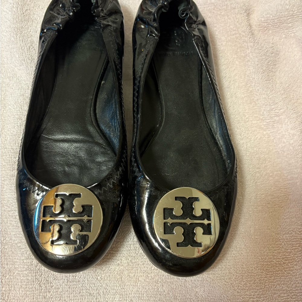 Tory Burch Shiny Black Flats with Silver Logo